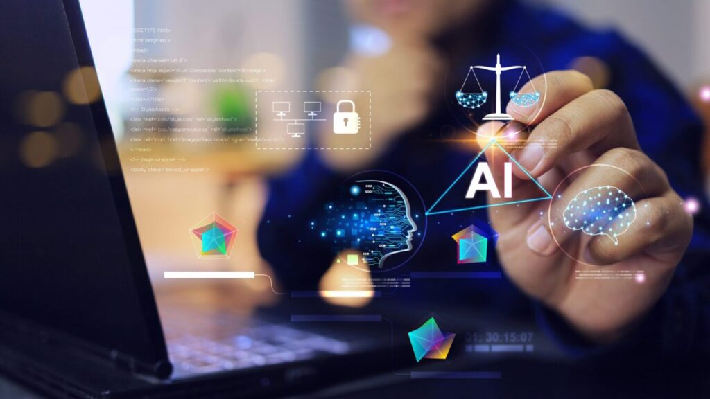 A person's hand interacting with a digital interface projected above a laptop, showing icons and code related to artificial intelligence, data security, justice, and the human brain